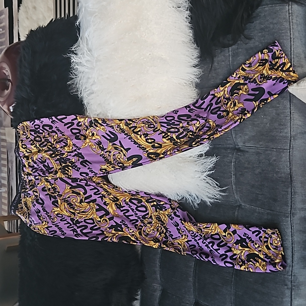 Versace leggings Pants purple  ( never worn) size 6 usa IT 42 NEW NO TAG